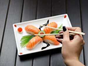 Person Eating Sushi